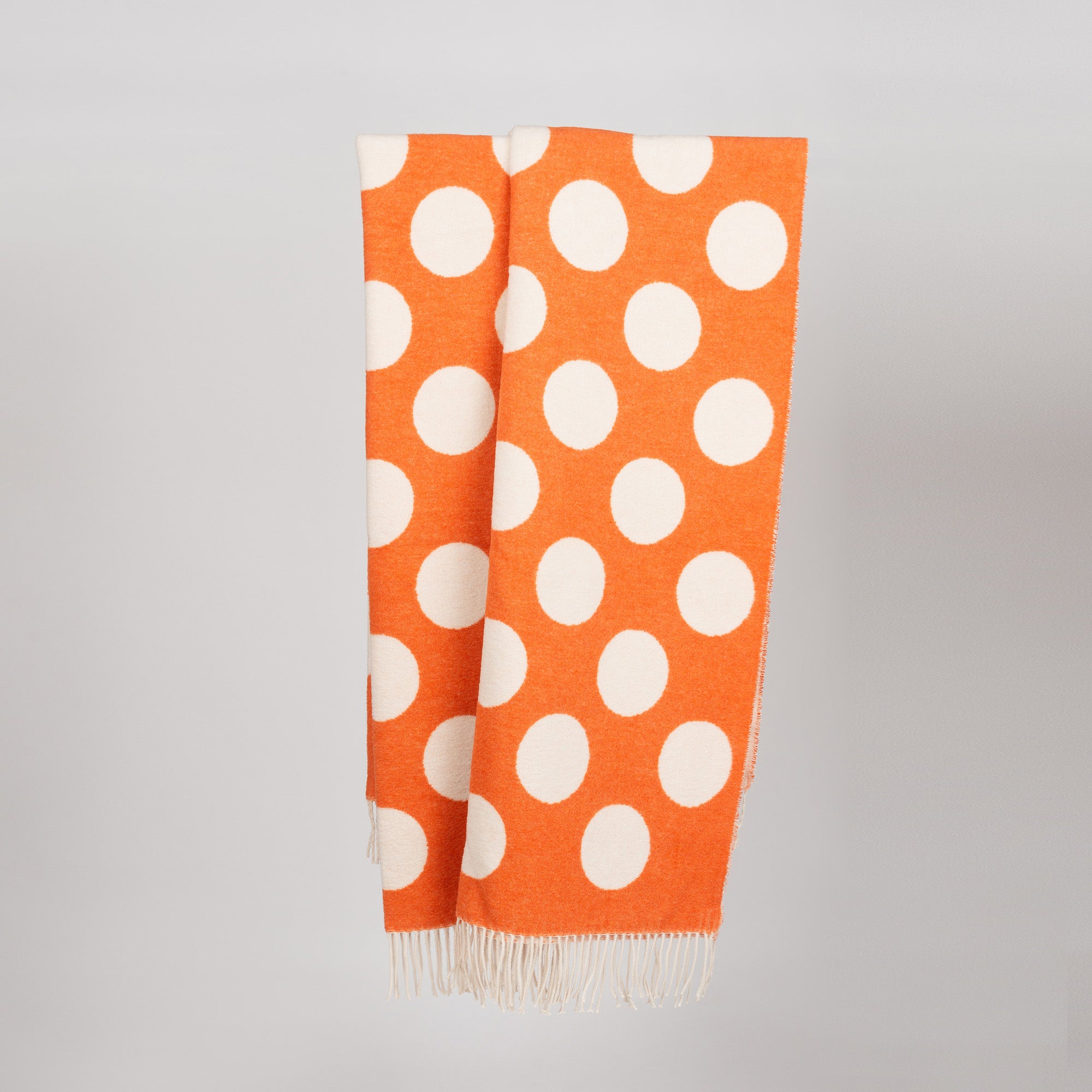 Wolldecke 150x195cm mit Punktemuster in Orange-Offwhite